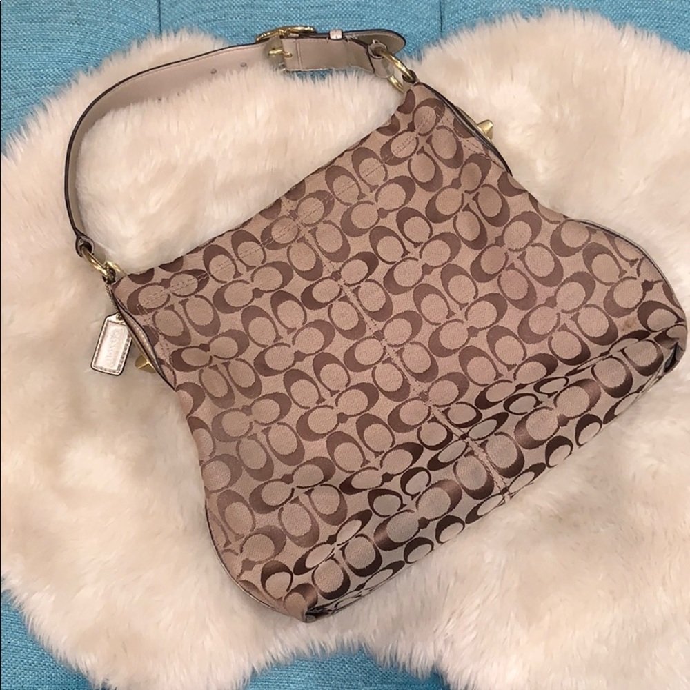 Tan coach with gold/champagne shoulder strap